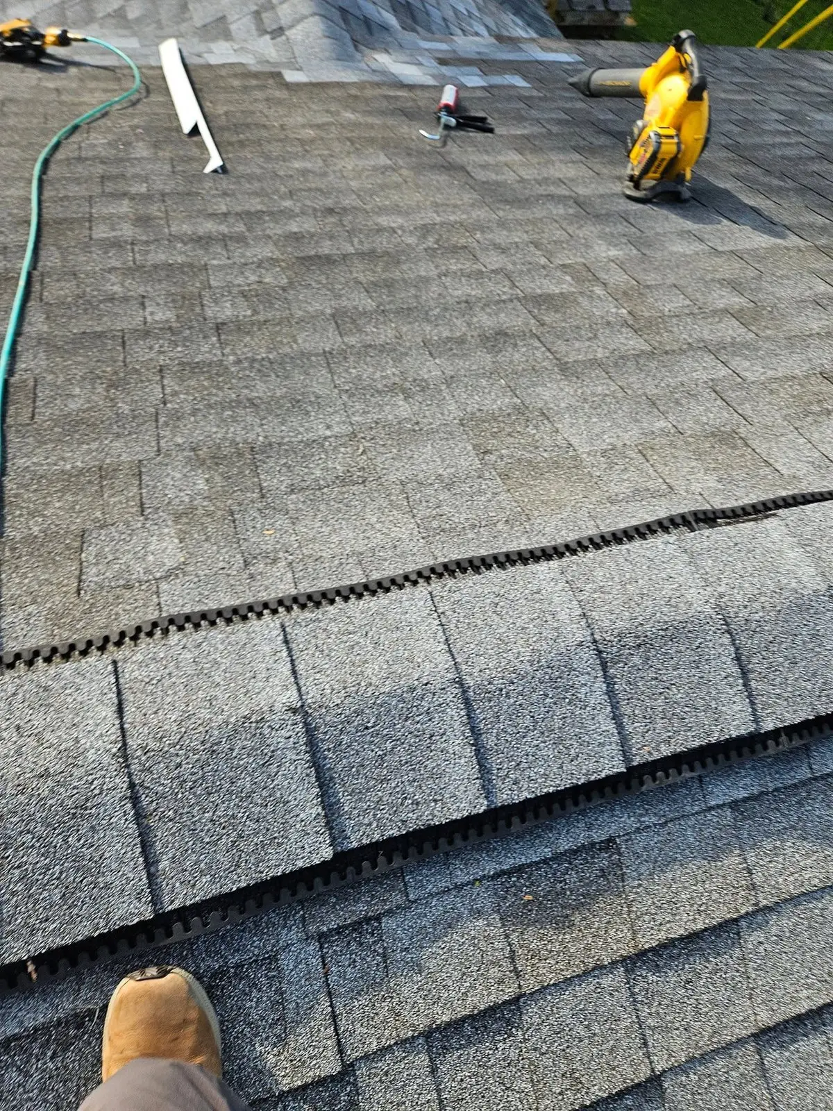 Roofing work in progress by Weber Construction