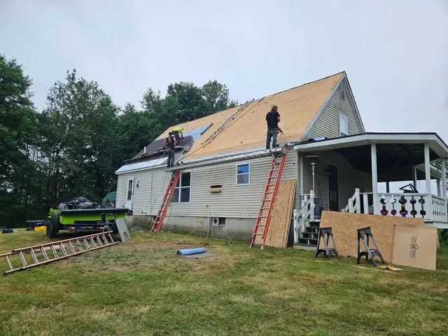 Weber Construction crew replacing the roof on a home